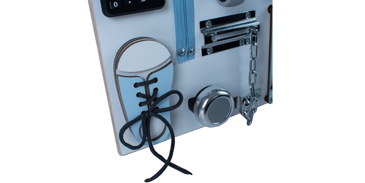 Tablica manipulacyjna MANIBOX Wszystkie elementy naszej tablicy wspierają rozwój dziecka Ponadczasowa zabawka edukacyjna