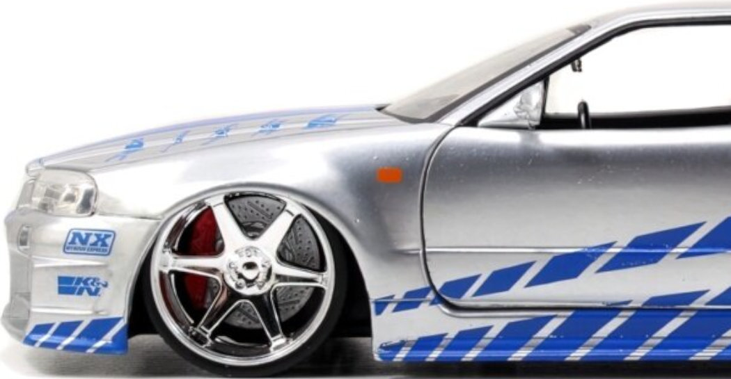 Samochód JADA TOYS Szybcy i wściekli 2002 Nissan Skyline GT-R zabawa realizm film ruchome obrotowe realistyczne