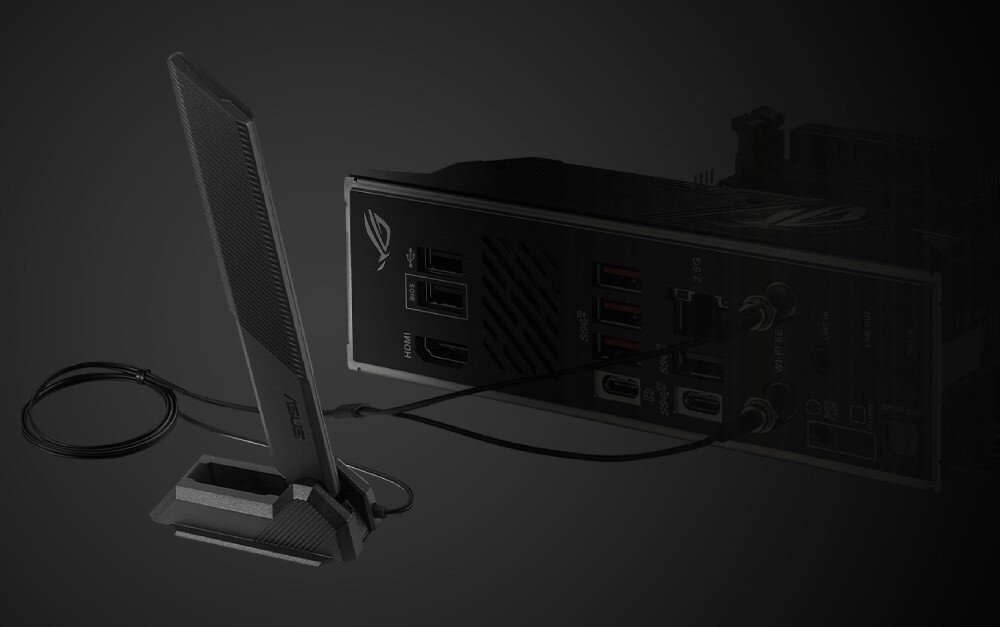 Płyta główna ASUS ROG Strix B650E-I Gaming WiFi Widok anteny Wi-Fi 6E podłączonej do tyłu płyty głównej, z kablami połączonymi z gniazdami sieciowymi i portami USB, łączność z siecią, kontroler Ethernet, łączność Wi-Fi 6E, antena