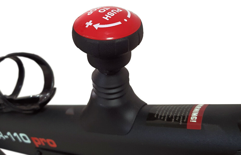 Rower spinningowy HERTZ FITNESS XR-110 Pro przycisk bezpieczeństwa po dociśnięciu zatrzymuje natychmiast koło zamachowe