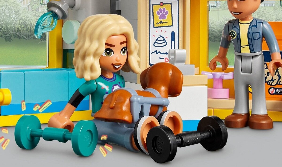 LEGO Friends Furgonetka ratunkowa dla psów 41741 dziecko kreatywność zabawa nauka rozwój klocki figurki minifigurki jakość tradycja konstrukcja nauka wyobraźnia role jakość bezpieczeństwo wyobraźnia budowanie pasja hobby funkcje instrukcje pies stół szczota mydło śmietnik kupa woda jedzenie