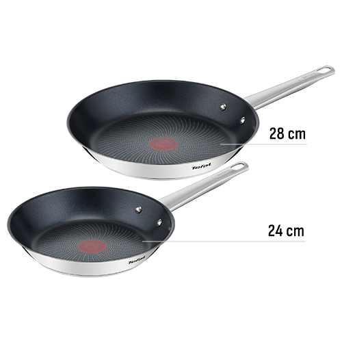 Na obrazie widoczne są dwie patelnie o różnych średnicach, z ciemnym wnętrzem i metalowymi uchwytami. Na dnie każdej patelni znajduje się czerwony okrągły wzór, a na boku widnieje napis \'Tefal\'.
