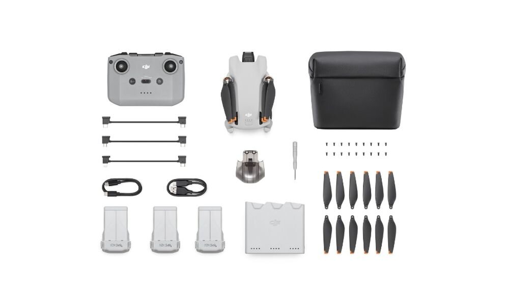 Dron DJI Mini 3 bateria lot sterowanie akrobacje czas lotu zasięg funkcje lądowanie kamera rozdzielczość filmy zdjęcia nagrywanie jakość ładowanie aplikacja przesył pilot śmigła stabilizacja fotografia waga wymiary konstrukcja obudowa korpus ramiona silnik