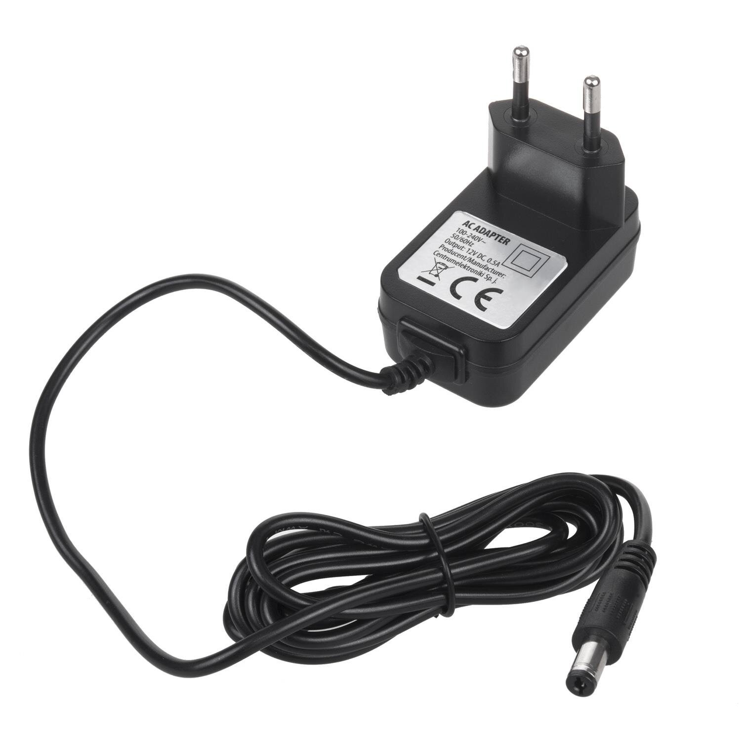 Na obrazie widoczny jest czarny zasilacz z wtyczką i kablem. Na zasilaczu znajduje się etykieta z napisem: \'AC-ADAPTER, Input: 100-240V, Output: 12V, 1A\'.