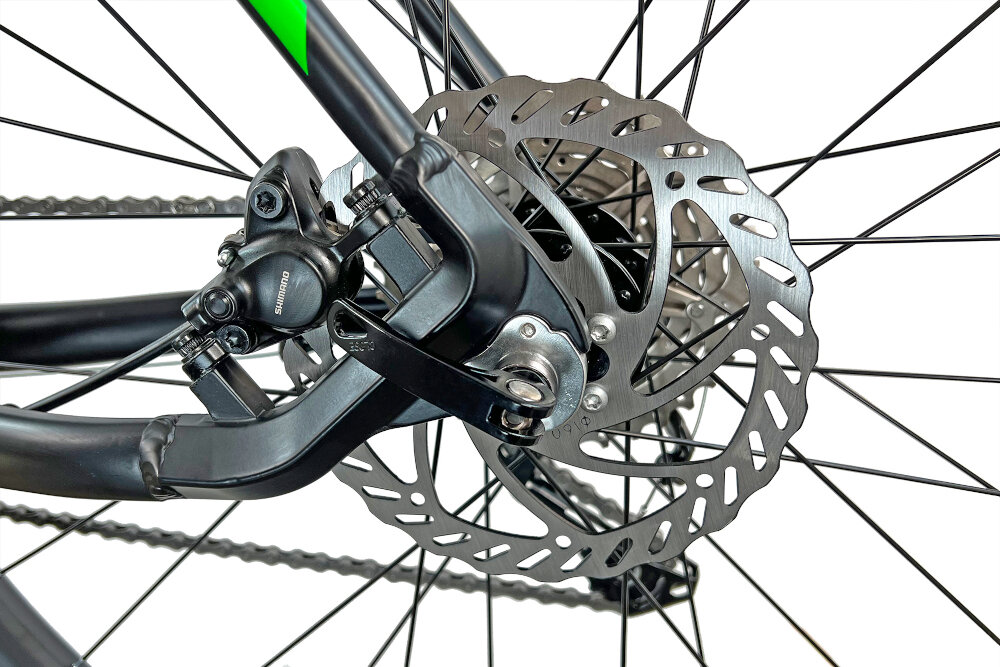 Rower górski MTB TORPADO Storm X6 M23 29 cali męski Czarno-zielony hamulce tarczowe hydrauliczne marki SHIMANO duża siła hamowania w każdych warunkach pogodowych na każdej trasie płyn hamulcowy precyzyjne określenie mocy hamowania