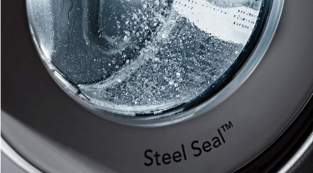 PRALKA ASKO W4086C.T 3 wizualizacja bęben drzwiczki nazwa technologii napis Steel Seal eliminacja brudu wilgoci bakterii