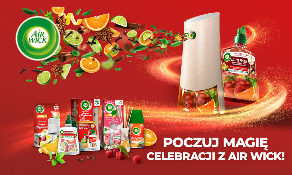 Na czerwonym tle widoczne są różne produkty marki Air Wick, w tym dyfuzor zapachowy oraz butelki z płynem. W tle unoszą się owoce i przyprawy, a na dole widnieje napis: \'POCZUJ MAGIĘ CELEBRACJI Z AIR WICK!\'.