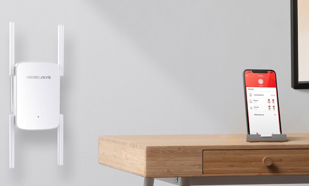 Wzmacniacz sieci MERCUSYS ME50G 2.4 / 5 GHz, Wi-Fi 5 (802.11 b/g/n/ac) wzmacniacz umieszczony na ścianie z widocznym smartfonem z uruchomioną aplikacją MERCUSYS