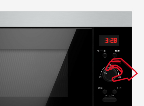 Kuchenka mikrofalowa Amica i pokrętło służące do regulacji parametrów urządzenia
