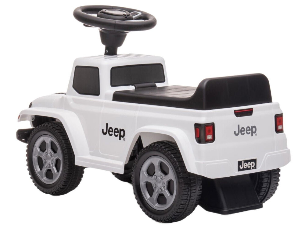 Jeździk SUN BABY Jeep Rubicon Gladiator Biały zasilanie dwie baterie AA zabezpieczenie przed wywroceniem sie pojazdu zabezpieczenie z przodu i z tylu pojazdu brak mozliwosci wywrocenia