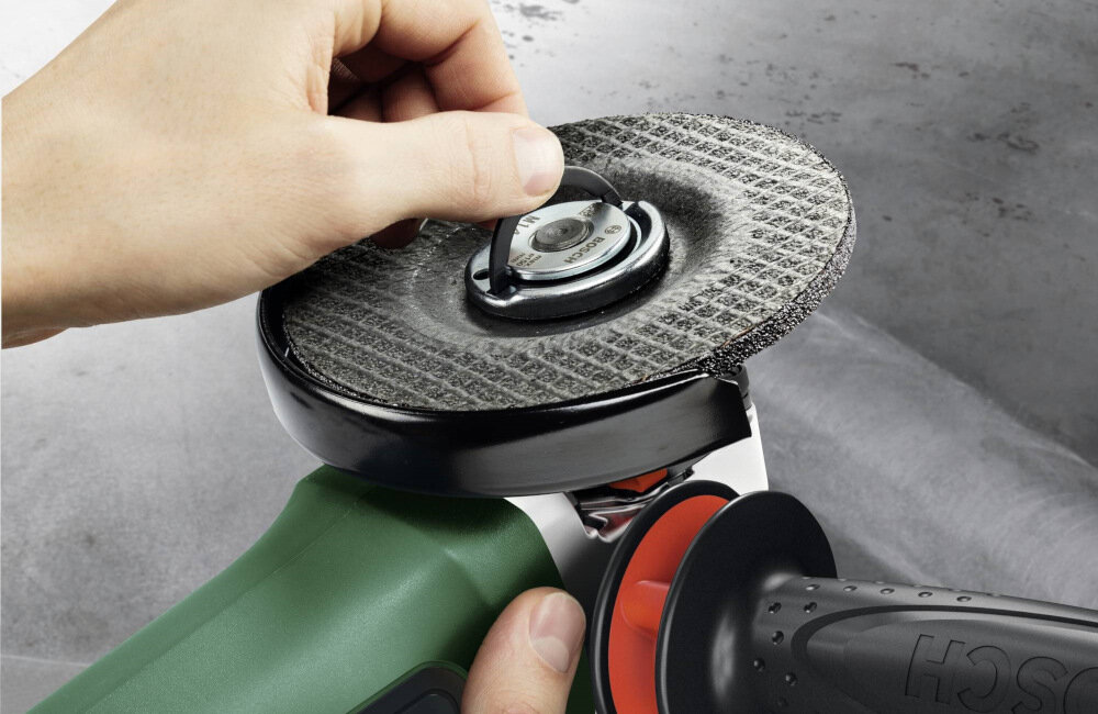 Szlifierka kątowa BOSCH Professional AdvancedGrind 18V-80 06033E5100 przycisk blokady wrzeciona M14 szybka wymiana tarczy beznarzędziowa