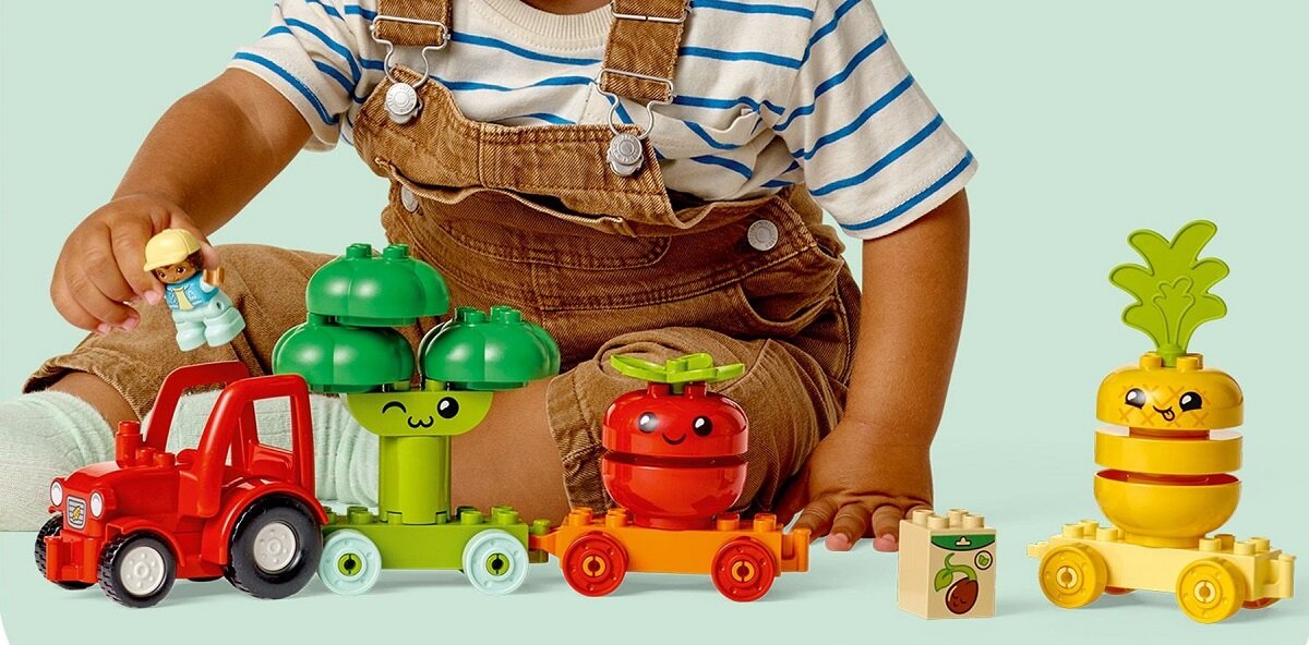 LEGO DUPLO Traktor z warzywami i owocami 10982 dziecko kreatywność zabawa nauka rozwój klocki figurki minifigurki jakość tradycja konstrukcja nauka wyobraźnia role jakość bezpieczeństwo wyobraźnia budowanie pasja hobby funkcje instrukcja aplikacja LEGO Builder