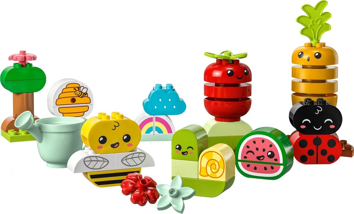 LEGO DUPLO Ogród uprawowy 10984 dziecko kreatywność zabawa nauka rozwój klocki figurki minifigurki jakość tradycja konstrukcja nauka wyobraźnia role jakość bezpieczeństwo wyobraźnia budowanie pasja hobby funkcje instrukcja aplikacja LEGO Builder pomidore marchewka arbuz deszczowa chmura tęcza drzewa kwiaty biedronka pszczoła ul konewka