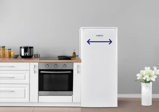 Lodówka MPM-200-CJ-29/E obok mebli kuchennych. Ikona dwustronnej gwiazdki.