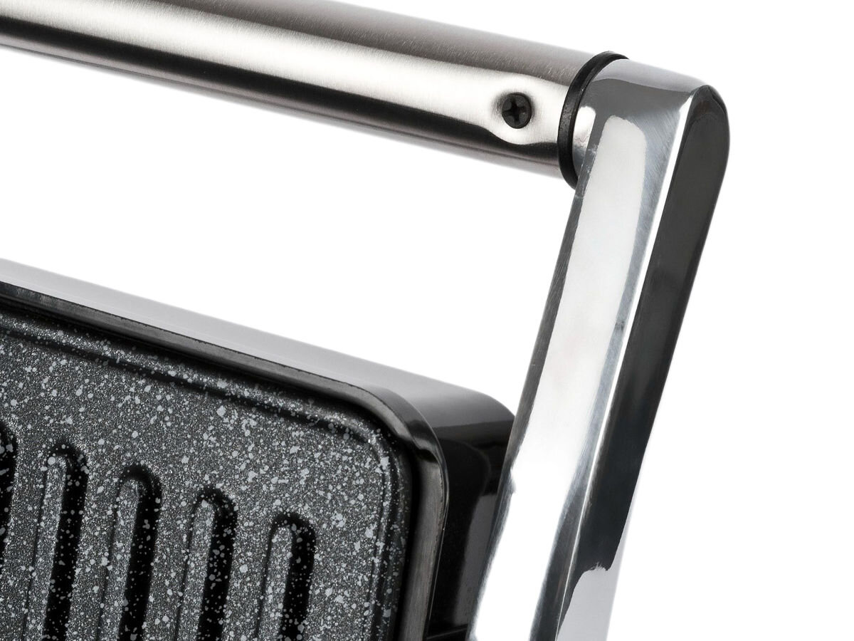 Grill elektryczny G3FERRARI Lavica Easy G10161, uchwyt, izolacja, termiczna, faktura, na białym tle zbliżenie na uchwyt grilla