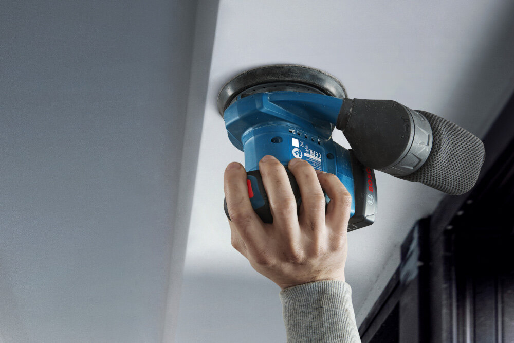 Szlifierka mimośrodowa BOSCH Professional GEX 185-LI mimosrodek tarcza szlifierska zamontowana ekscentrycznie do osi obrotu tarcza o srednicy 125 mm
