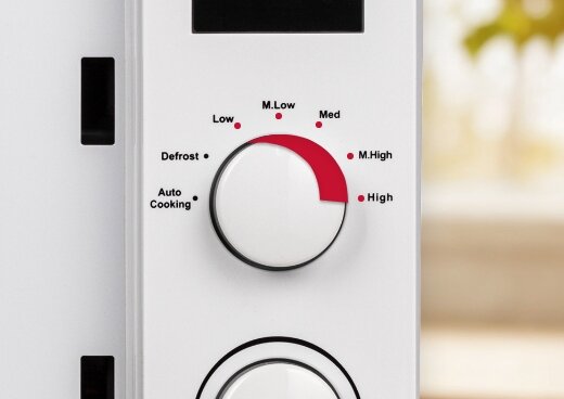 Zbliżenie na pokrętło z poziomami grzania.