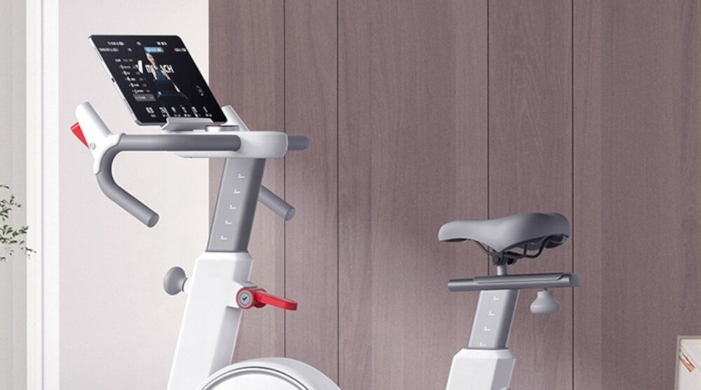 Rower spinningowy MERACH Swan uniwersalny stojak na tablet na górze kolumny kierowniczej