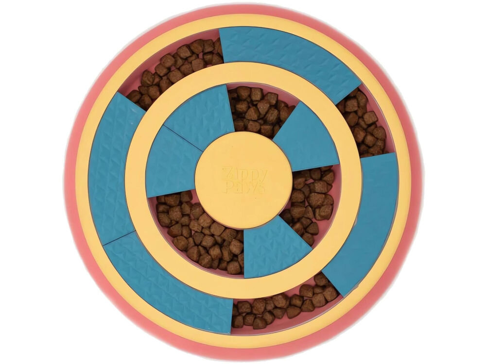 Miska spowalniająca dla psa ZIPPYPAWS ZP1424 Na zdjęciu znajduje się miska spowalniająca dla psa z kolorowymi elementami w kształcie okręgów, wypełniona suchą karmą. Na środku miski widoczny jest napis Zippy Paws