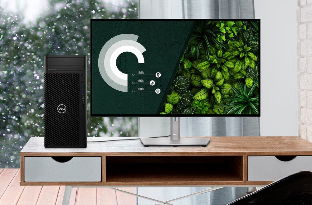Komputer DELL Precision 3660 Komputer typu tower na biurku obok monitora z wyświetlonymi zielonymi roślinami i wykresami procentowymi; w tle okno z zaśnieżonym widokiem, łączność, Wi-Fi 6, Bluetooth 5.2, porty