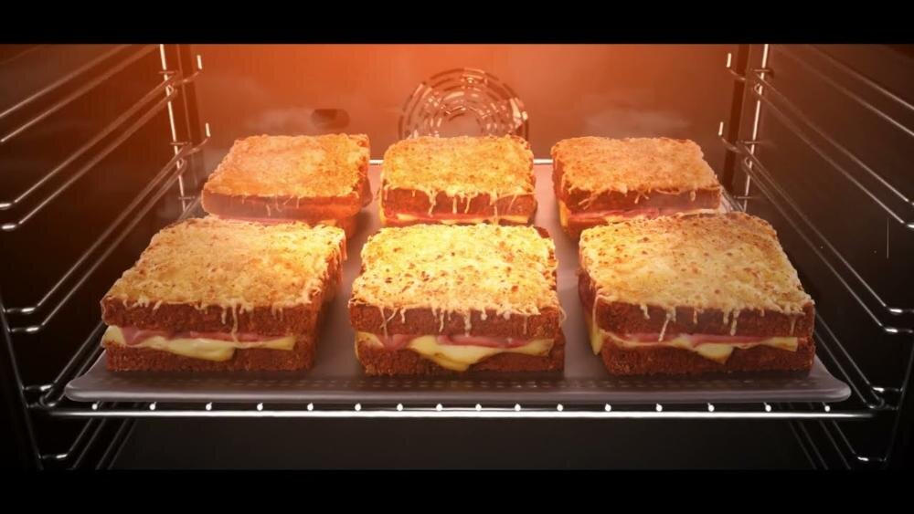 BRANDT BOP2112B piekarnik równomierna cyrkulacja gorące powietrze rozprowadzanie ciepło wentylator grzałka wylot równomierna stabilna temperatura