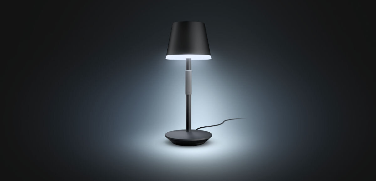 Lampa stołowa PHILIPS HUE 929003128501 Czarny, odcień, biel, temperatura, intensywność, na ciemnym tle lampka z włączoną chłodną barwą światła