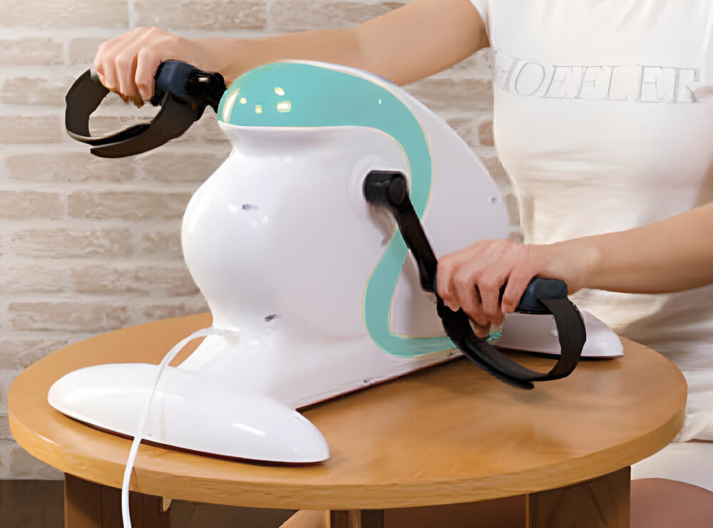 Rotor EVERFIT Welly E ergonomicznie uksztaltowane pedaly pedalowanie nogami i rekoma kierunke dzialania w przod i w tyl praktyczne paski na pedalach
