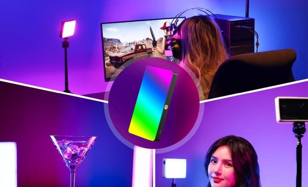 Obraz przedstawia dwie osoby korzystające z komputerów w pomieszczeniu oświetlonym kolorowymi lampami LED. W centrum znajduje się grafika przedstawiająca kompaktową lampę LED z gradientem kolorów.