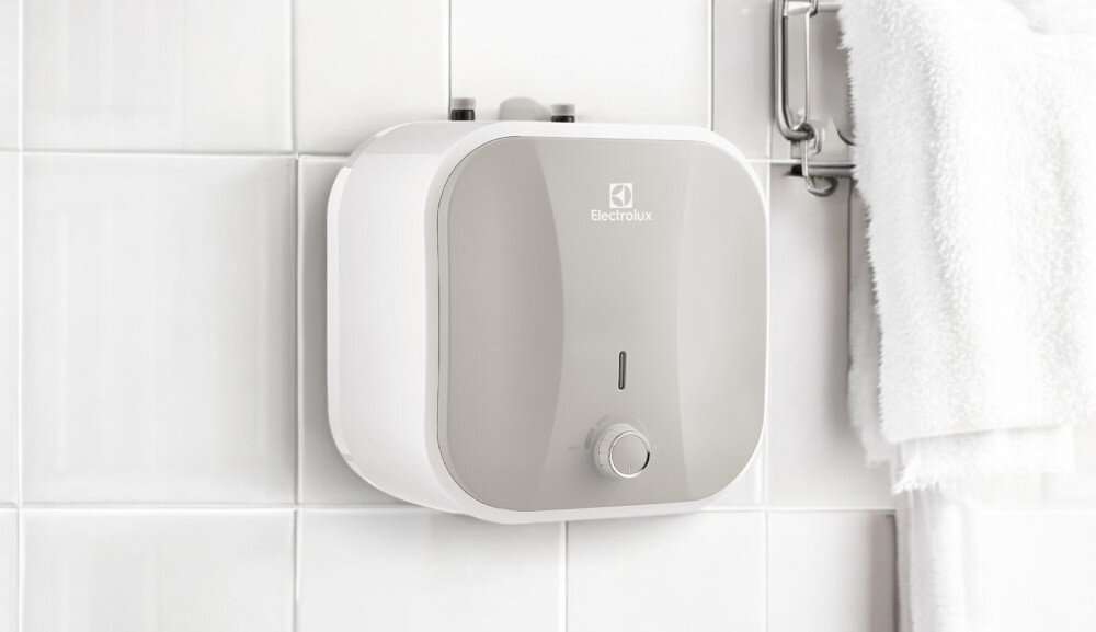 BOJLER ELEKTRYCZNY ELECTROLUX EWH10QUEEC kompaktowy podgrzewacz wody łatwa instalacja ścienna pojemność 10 litrów górne podłączenie 324 x 324 x 315 mm oszczędność miejsca biała obudowa estetyczny wysoka jakość wykonania