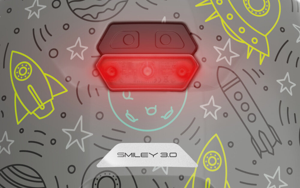 Kask rowerowy ABUS Smiley 3.0 LED Szaro-zielony dla Dzieci (rozmiar M) tylne światało LED zakres 180 stopni odblaski