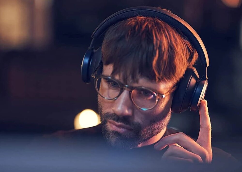 BANG & OLUFSEN Beoplay Portal дизайн навушників комфорт легкість якість звуку враження від прослуховування ергономіка легкість спорт діяльність подорож робочий час робота акумулятор