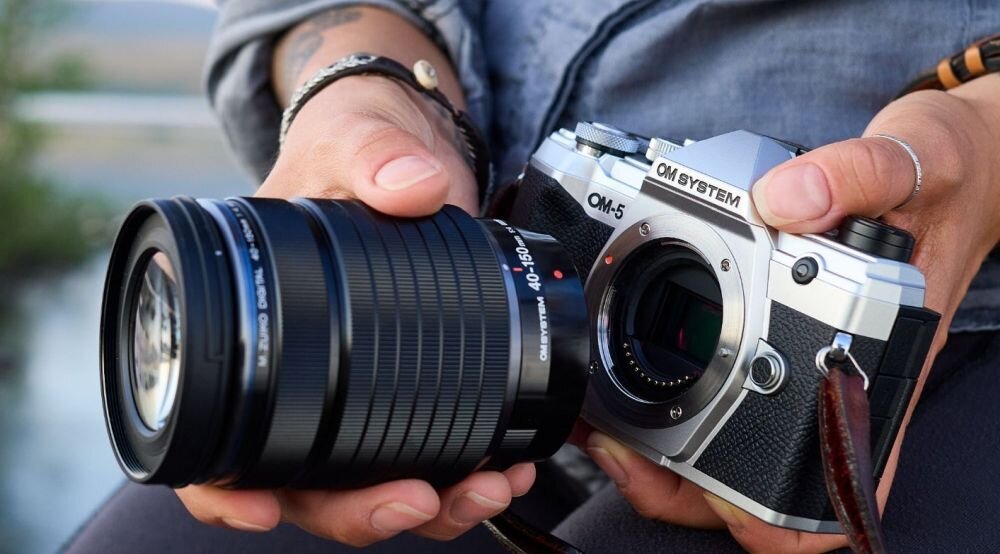 Aparat OLYMPUS OM-5 zdjęcia obiektyw ekran wizjer ogniskowa przysłona migawka obudowa bateria zasilanie filmy nagrywanie rozdzielczość matryca rozmiar przekątna tryby iso montaż lampa światło przyciski sterowanie menu kontrast jasność balans bieli filtry cmos karta pliki format zapis seria