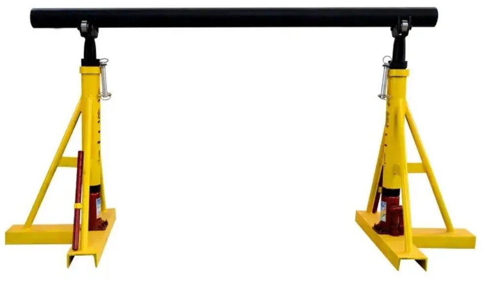 Stojak bębnowy EXTRALINK EX.33029 Dwa żółte metalowe wsporniki połączone u góry czarną poziomą osią, z czerwonymi siłownikami hydraulicznymi przy podstawach