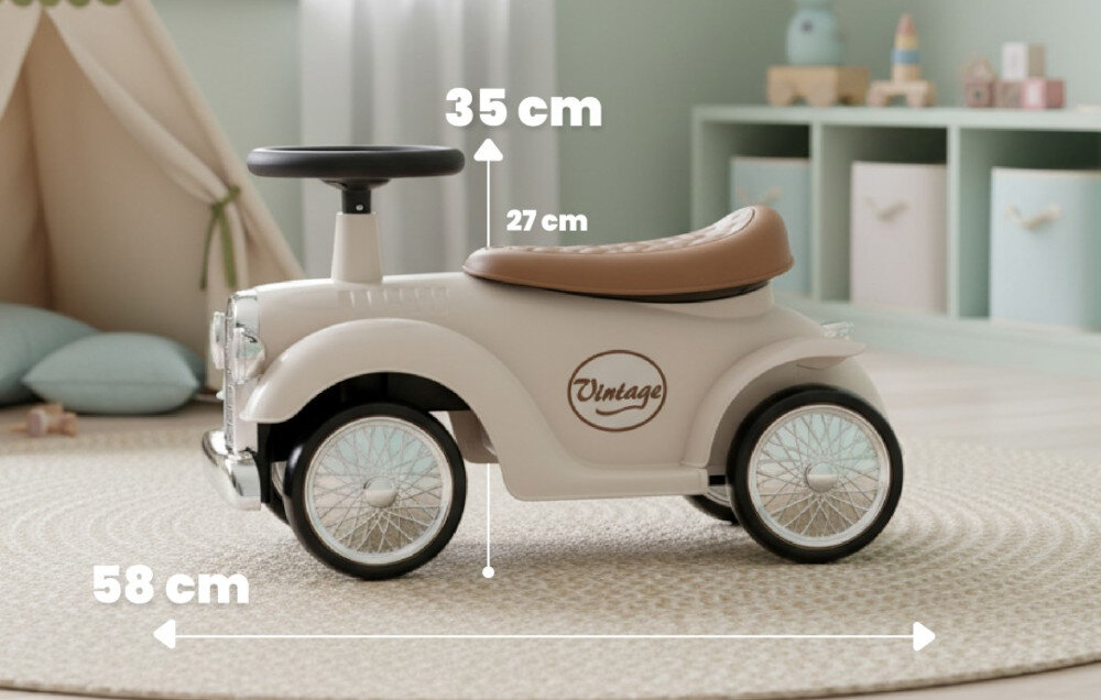 Beżowy jeździk w stylu retro z brązowym siedzeniem i czarną kierownicą, z napisem \'Vintage\' na boku. Obok jeździka widoczne są wymiary: 58 cm długości, 35 cm wysokości i 27 cm wysokości siedzenia.