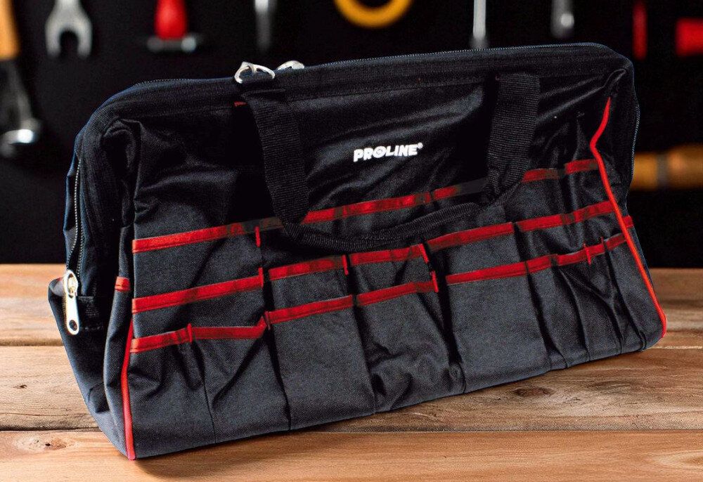 Torba na narzędzia PROLINE 62150 66L duża pojemność mocny poliester 600D suwak - na stole roboczym w garażu