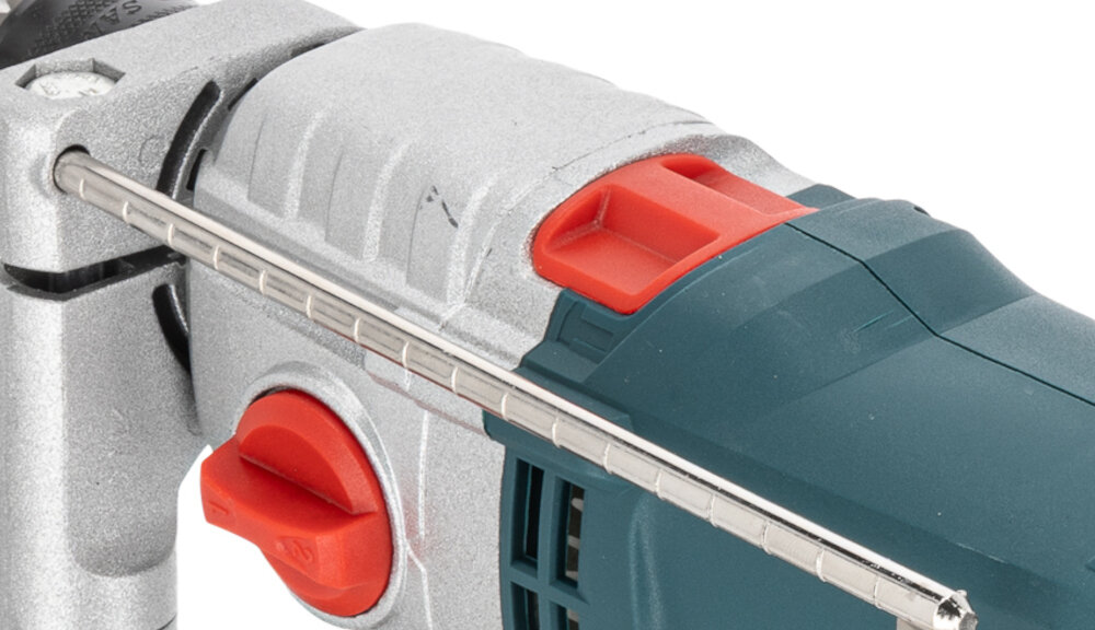 Wiertarka udarowa TRYTON TDW1050A zbliżenie na przełącznik do zmiany trybu pracy dwa tryby pracy – z udarem i bez udaru funkcja udaru ułatwia wiercenie w betonie i murze tryb bezudarowy sprawdzi się przy precyzyjnym wierceniu w drewnie i metalu