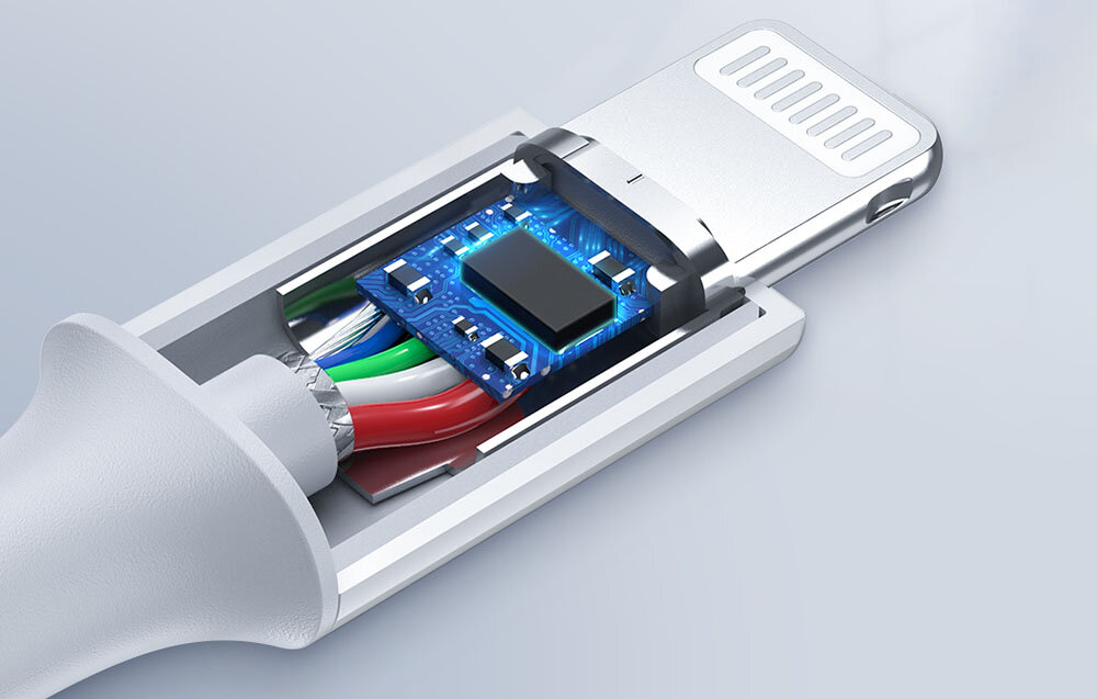 Obraz przedstawia zbliżenie na końcówkę kabla z widocznymi wewnętrznymi przewodami i układem elektronicznym. Kabel jest biały, a przewody mają różne kolory.