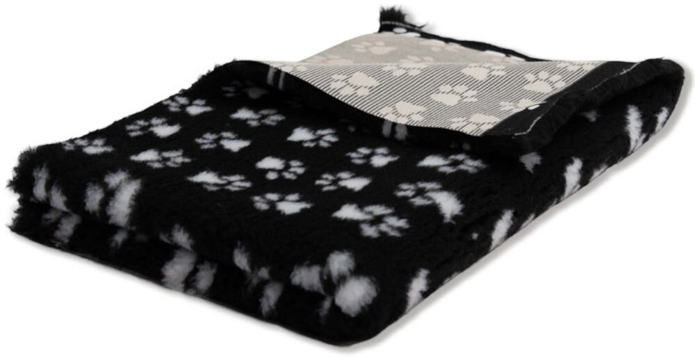 Legowisko uniwersalne BUBA Dry Bed A23 czarny w łapki 75 x 50 Złożony czarny w łapki dywanik lub mata z widoczną puszystą, wełnistą fakturą wierzchnią i jasnym, płóciennym spodem.