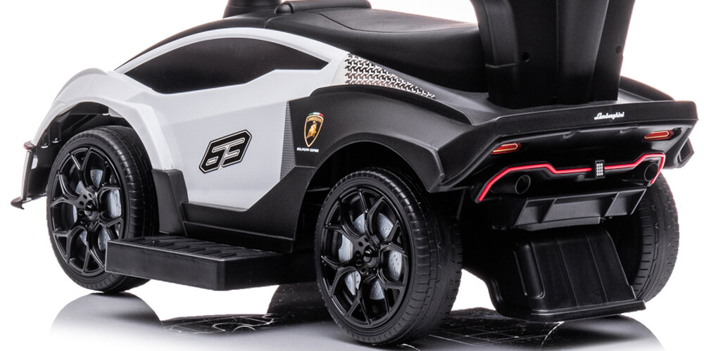 Jeździk SUN BABY Lamborghini Essenza SCV12 Biały 4 kola gruby bieznik odpowiednia przyczepnosc do kazdej powierzchni maksymalne obciazenie do 25 kg wysuwane podporki dla stop stabilna bezpieczna jazda