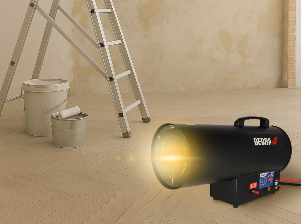 Nagrzewnica gazowa DEDRA DED9947, obudowa, zabezpieczenie, wentylacja, blokada, Bok nagrzewnicy Dedra DED9947, wylot powietrza, uchwyt transportowy, czarna metalowa obudowa.