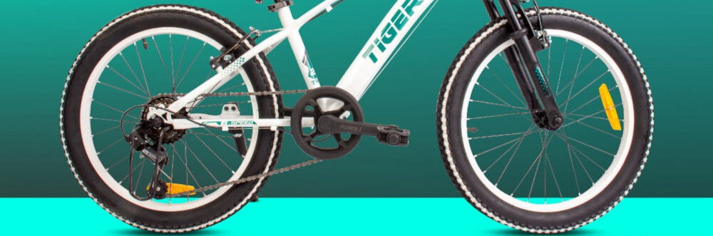 Rower dziecięcy SUN BABY Tiger Bike 20 cali dla chłopca Biało-zielony kola rozmiar 20 cali aluminiowe obrecze kola zachowuja ksztalt opony stabilnie trzymane bezpieczna jazda szerokie opony typu BMX doskonala przyczepnosc do podloza regularne sprawdzanie cisnienia powietrza wartosc na bocznej czesci opony