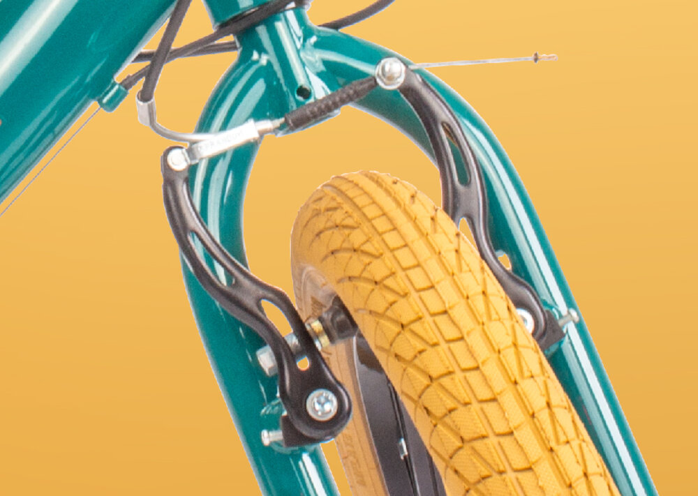 Rower dziecięcy SSUN BABY Verdant Rowan 20 cali dla chłopca podstawa bezpieczenstwa kazdego rowerzysty hamulce V-Brake na przod na tyl lekkie duza sila hamowania przedni amortyzator Orbi Shocks typ AM.M 31.8 S tlumi drgania i wstrzasy