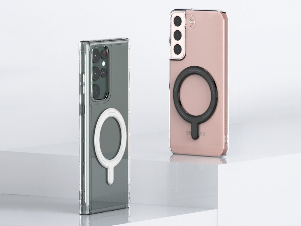 Pierścień magnetyczny ARAREE Cling M Magsafe
                różne modele telefonów z przymocowanym pierścieniem magnetycznym samoprzylepny precyzyjna miarka akcesoria magsafe etui Porównanie białego i czarnego pierścienia magnetycznego araree Cling M na pleckach smartfonów Samsung Galaxy w przezroczystych obudowach.