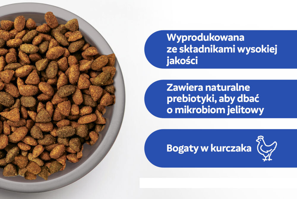 Karma dla kota PERFECT FIT Indoor Kurczak 7 kg Zbliżenie na miskę wypełnioną brązowo-zielonymi granulkami suchej karmy dla kotów. Obok, na niebieskim tle, znajdują się trzy punkty tekstowe: Wyprodukowana ze składnikami wysokiej jakości. Zawiera naturalne prebiotyki, aby dbać o mikrobiom jelitowy. Bogaty w kurczaka (z ikoną kurczaka).
