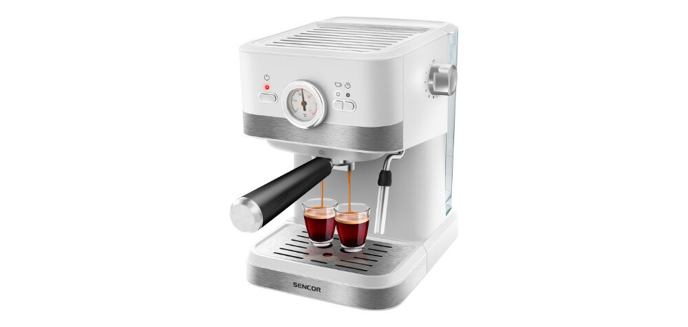 Biały ekspres do kawy z manometrem na przednim panelu, dwoma filiżankami espresso na tacy ociekowej i logo \'SENCOR\' na podstawie.