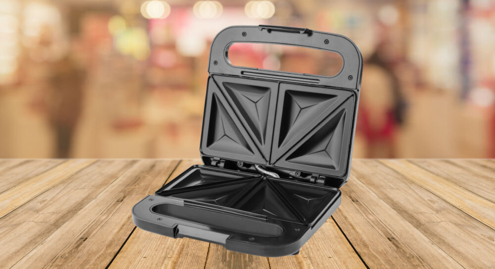 Opiekacz ETA Crux 316390000 idealnie chrupiące kanapki i tosty trójkątnne nieprzywierające płytki szybkie łatwe bezproblemowe przygotowywanie dań 