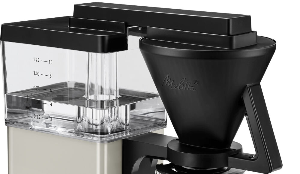 Ekspres MELITTA One 1031-03 Kremowy funkcje zwiększony komfort użytkownaia wyjmowany filtr zapobiegający kapaniu podświetlenie LED pojemnika na wodę zintegrowany program odkamieniania udogodnienia łatwa obsługa konserwacja długotrwała satysfakcja 