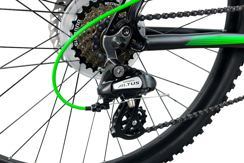 Rower górski MTB INDIANA X-Pulser 2.6 M19 26 cali męski Czarno-zielony przerzutki marki SHIMANO duza wytrzymalosc sprawne dzialanie plynna bezproblemowa zmiana biegow 21 biegow przednia przerzutka SHIMANO Tourney tylna przerzutka SHIMANO Altus technologia Shadow
