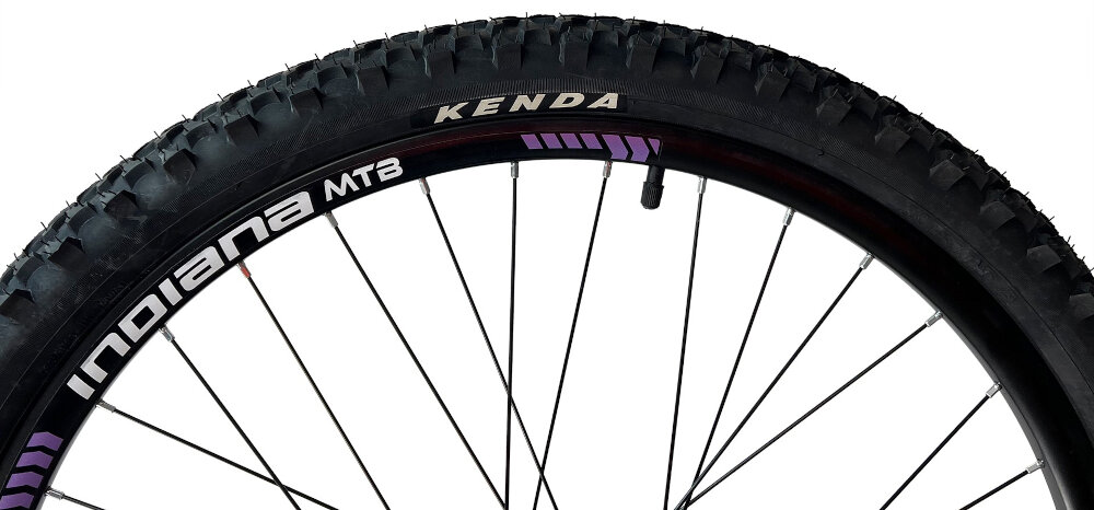 Rower górski MTB INDIANA X-Pulser 2.6 D19 26 cali damski Biało-fioletowy kola rozmiar 26 cala latwe pokonywanie przeszkod wiekszy kontakt kola z podlozem szerokie opony marki KENDA gleboki bieznik dobra przyczepnosc regularne sprawdzanie cisnienia powietrza wartosc na bocznej czesci opony