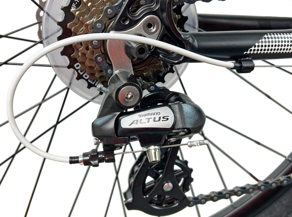 Rower górski MTB INDIANA X-Pulser 2.6 D19 26 cali damski Biało-fioletowy 21 biegow przednia przerzutka SHIMANO Tourney tylna przerzutka SHIMANO Altus technologia Shadow przerzutka jest schowana mniej narazona na uszkodzenia duza wytrzymalosc sprawne dzialanie plynna bezproblemowa zmiana biegow